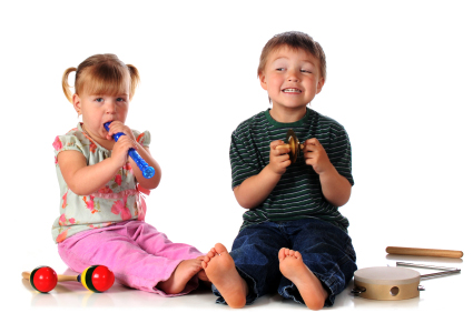 Children Enjoying Playing some instruments in a preschool music lesson