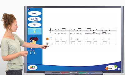 Teacher using elementary music curriculum