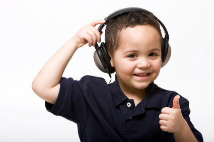 Student enjoying a music listening curriculum