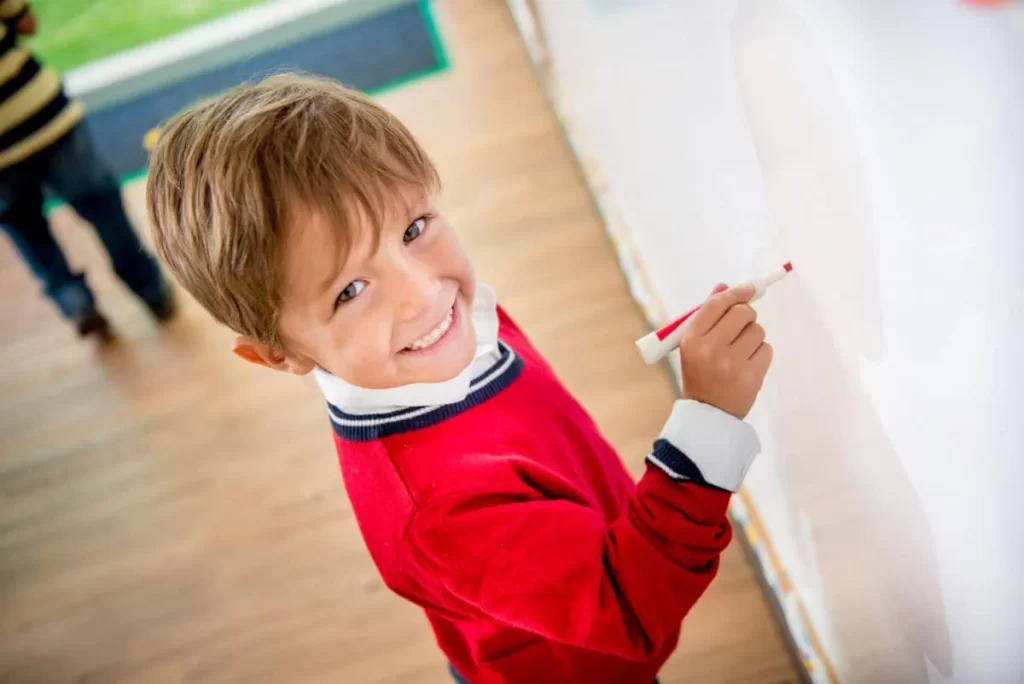 Grade2Student_DrawingOnWhiteboard Grade2student Drawing On Whiteboard