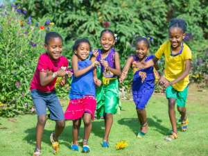 Children singing the Kye Kye Kule Song